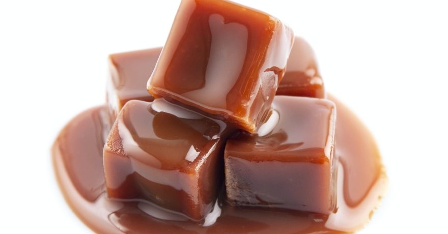 Caramel candy with caramel topping
