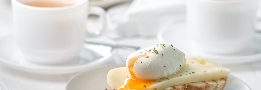 sandwich with poached egg and fresh cheese