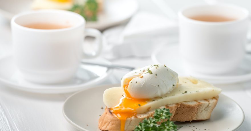 sandwich with poached egg and fresh cheese